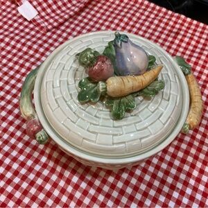 Lovely FITZ & FLOYD Veggie server.  
Basket weave with applied veggies/handles.